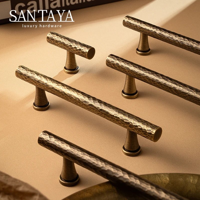 Hand-hammered antique brass cabinet handle gallery image 1