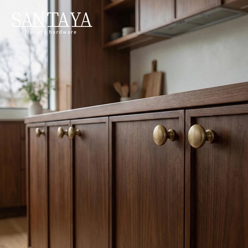 Antique brushed brass single-hole cabinet knob gallery image 4