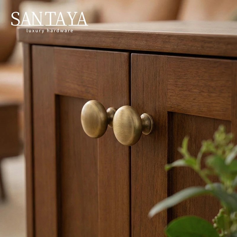 Antique brushed brass single-hole cabinet knob gallery image 5
