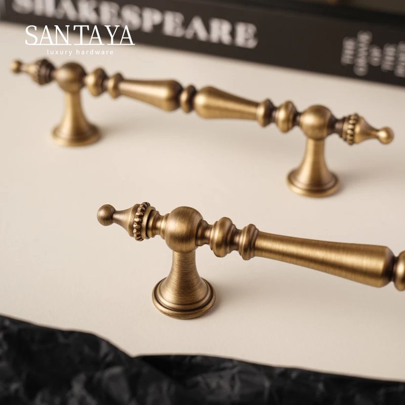 Antique brass crown cabinet handle gallery image 1